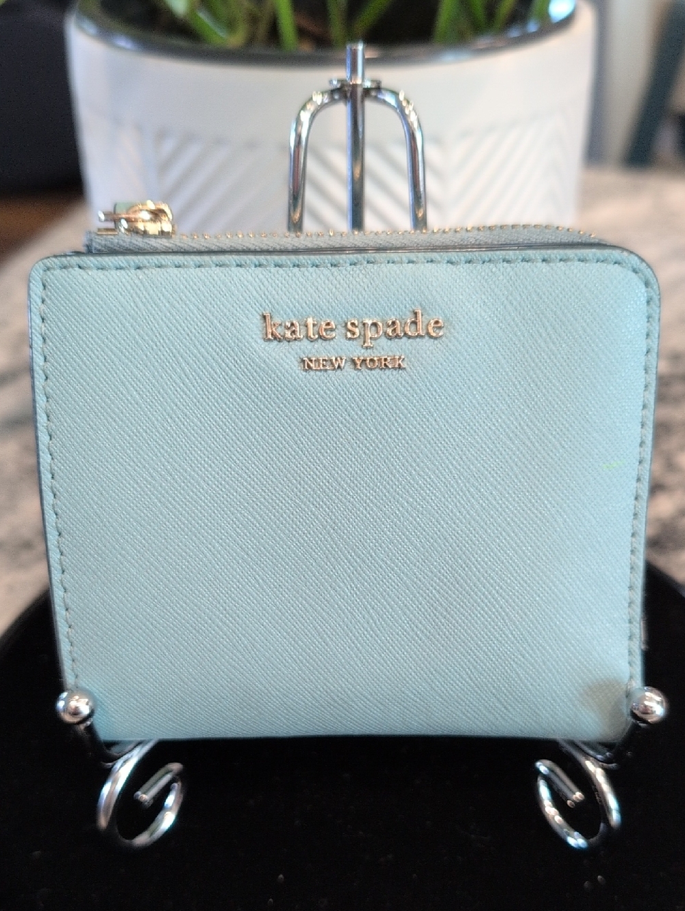 kate spade light blue zip-around compact wallet with gold logo